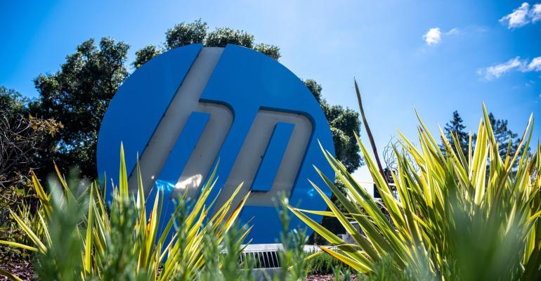 HP logo sign outside with grass in front