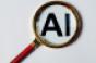 magnifying glass hovering over the letters "AI"