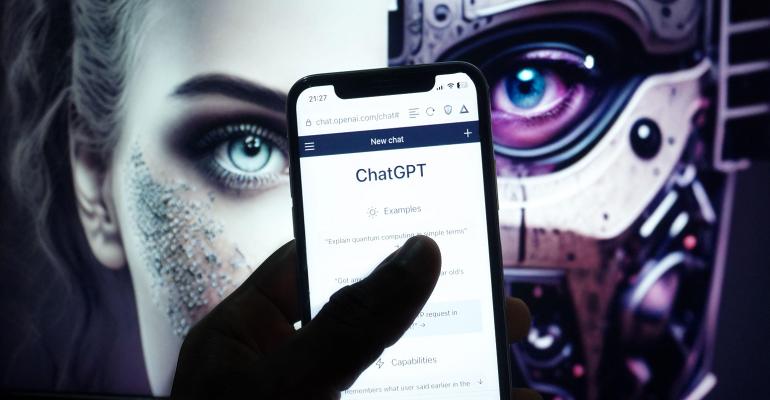 ChatGPT on smartphone held by robot