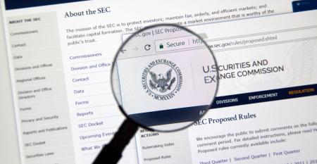 SEC webpage under magnifying glass